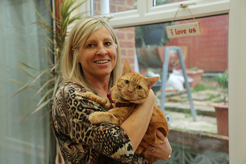 Ginger cat Jersey with mum at home