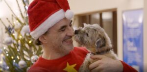 Noel Fitzpatrick and Border Terrier Keira at Christmas